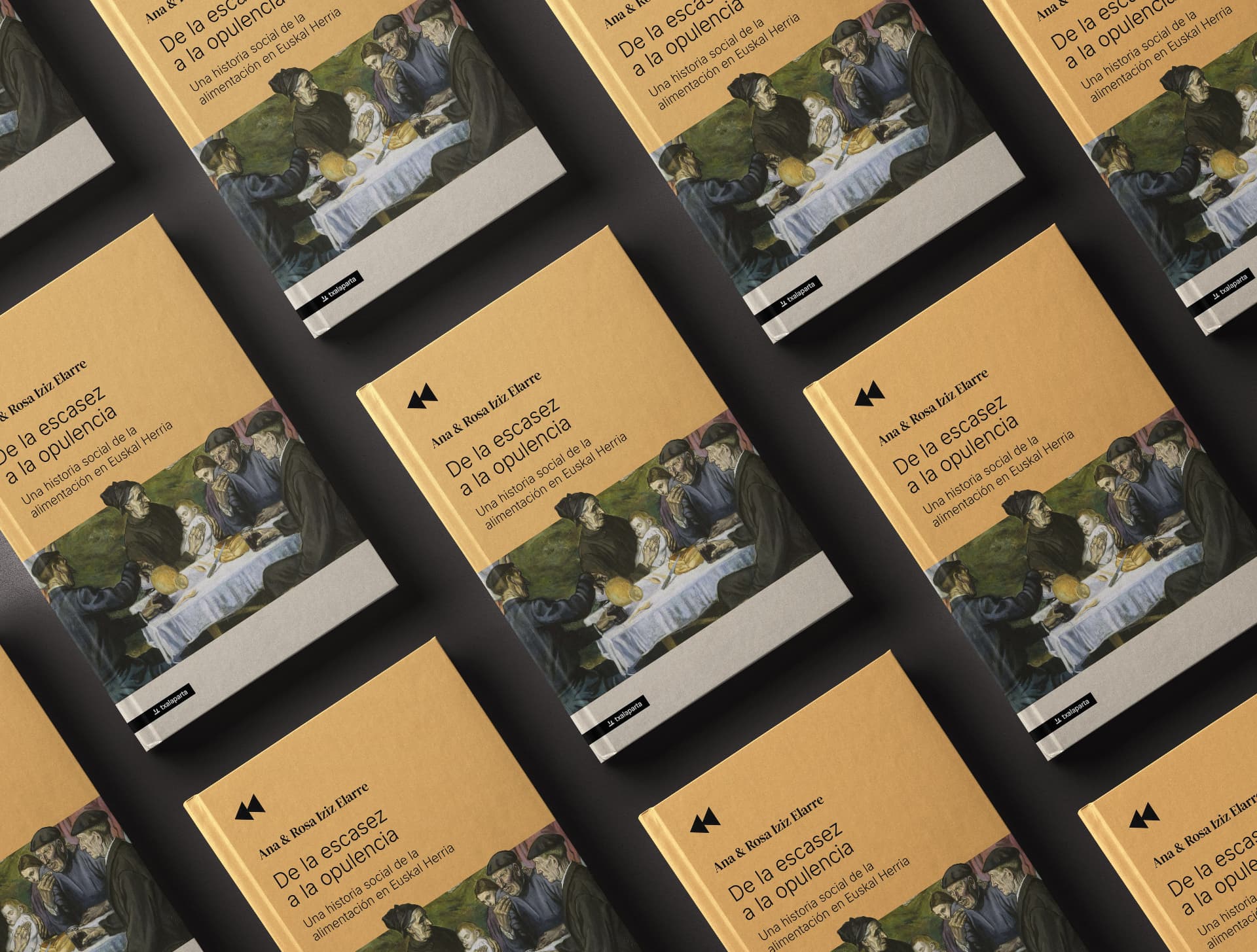 Varios ejemplares del libro dispuestos sobre una alfombra